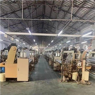 Telaio a getto d'acqua TSUDAKOMA usato